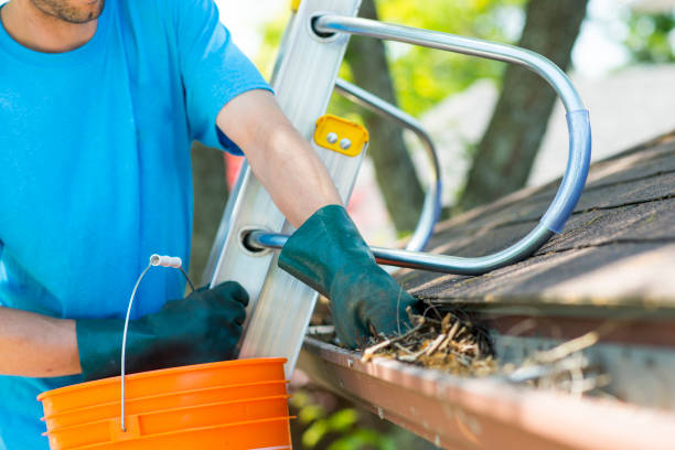 Gutter cleaning and maintenance work being done on a residential property in Cincinnati Ohio